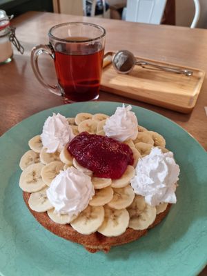 Vegan waffle with vegan whipped cream amd strawberry jam at Heart-Garden Waffles & Coffee in Amsterdam