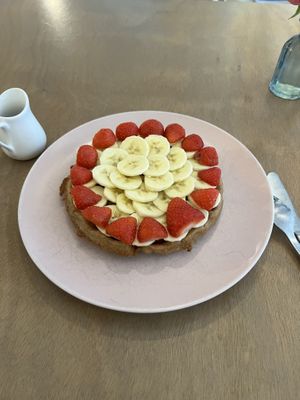 Bananas and strawberries waffle pancake with maple syrup 🍌🍓🥞  at Heart-Garden Waffles & Coffee in Amsterdam