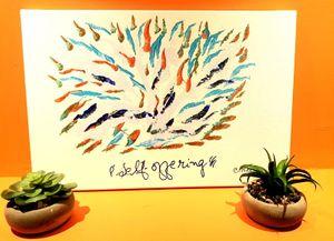 Beautiful and colorful Artwork from the owners spiritual inspiration source Sri Chinmoy all around the cafe.  at Heart-Garden Waffles & Coffee in Amsterdam