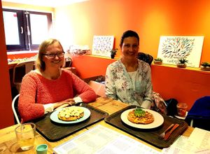 Visiting with a dear friend, nice waffles and great atmosphere. This is the downstairs seating area. Upstairs is the blue seating area. They also have  a terrace. at Heart-Garden Waffles & Coffee in Amsterdam