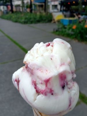 Two scoops (partially eaten) of cheesecake ice cream at IceLab NiceCream Creations in Antwerpen