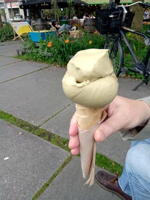 Two scoops of pistachio ice cream in a cone at IceLab NiceCream Creations in Antwerpen
