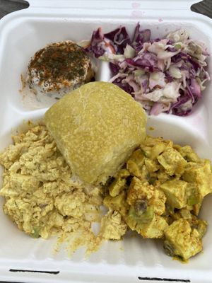 Pit stop sampler with crab cake, slaw, curried tofu, egg salad and a challah bun.   at Root 66 Cafe in Santa Fe
