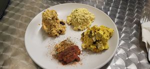 Pit stop sampler with chickpea salad, egg salad, curried tofu, and crab cake at Root 66 Cafe in Santa Fe