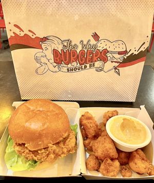 Zero clucks burger made vegan and a side serve of cauliflower bites with sauce changed to vegan  at Burger Urge in Bundaberg