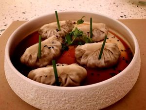 Incredibly delicious dumplings stuffed with sunflower seed based meat, in hoisin sauce at Koukoumi Hotel in Mykonos