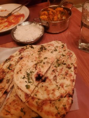 Garlic Naan, rice, and tofu chili at The Madras Cafe in Orlando
