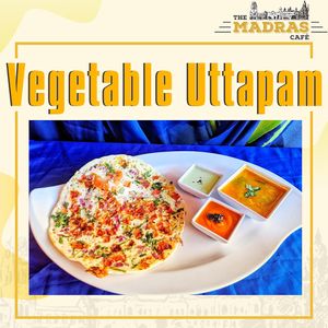 Vegan Indian Cuisine  - served with coconut chutney , tomato chutney and Sambar soup  at The Madras Cafe in Orlando