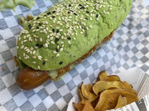 Hot dog and sweet potato crisps at BEIJU HEALTHY FUN FOOD in Cascais