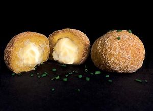 Bolinha de milho e queijo.  at BEIJU HEALTHY FUN FOOD in Cascais