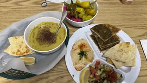 Lentil soup, hummus, pickled vegetables, Lebanese salad, za’atar bread  at Mazzah in Boise