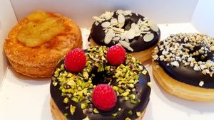 Cinnamon-Apple Compote Cross, Raspberry-Pistachio Cross, Almond Choc and Hazelnut at Royal Donuts in Dusseldorf