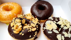 Classic Kiwi, Peanut Choc, Black Vegan and Almond Choc 😋 at Royal Donuts in Dusseldorf