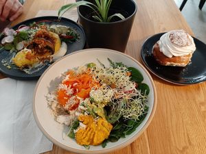 Delicious veggie bowl, potato cakes and pastry (vastlakukkel). at Kringel in Tallinn
