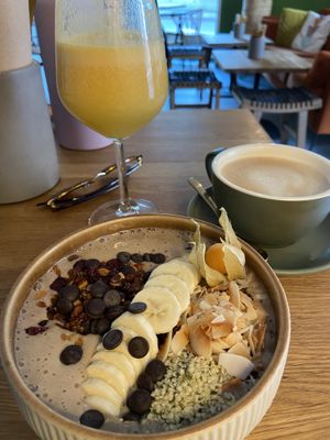 Coffee chocolate smoothie bowl, orange juice and coffee  at Kringel in Tallinn