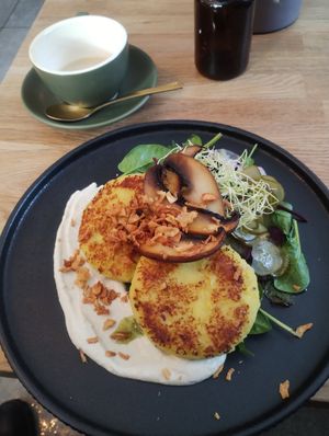 Potato pancakes with cashew cream, mushrooms and pickles at Kringel in Tallinn