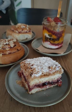 Marzipan cinnamon rolls (left), Napoleon cake (front) and fruit crumble jar (far right) at Kringel in Tallinn
