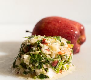 Baeness Apple Coleslaw: This slaw is a delightful mix of apples, pumpkin seeds, cabbage, and carrots. at Plant Bae in Montgomery