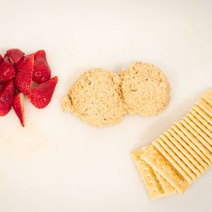 Toona Bae: A generous scoop of "toona" salad made of chickpeas and butterbeans is served with crackers and fruit. at Plant Bae in Montgomery