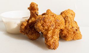 Call Me Bae Wings: Five double-battered cauliflower wings are served with vegan ranch. at Plant Bae in Montgomery