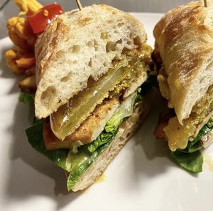 Fried Green Tomato sandwich smoked tofu, lettuce, cornmeal and rice crusted tomatoes.... at Above Ground - Pop-up in Oakland