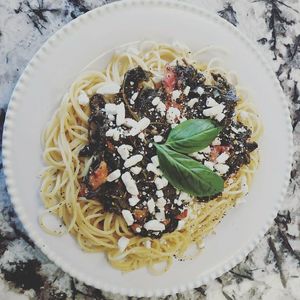 Sautéed Spinach and Tomato roasted garlic Drizzled w/ EVO finished w/ Vegan Feta at Pizzanada in Bloomfield