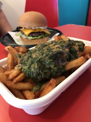 Creamy spinach loaded fries. Just get it, no regrets!  at Love Handle in Central Singapore