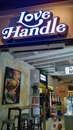 Shop sign at Love Handle in Central Singapore