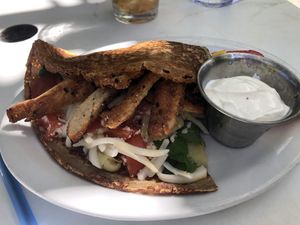 Zorba the greek crepe without olives and added gardein chicken was delicious! Double check because the server gave us non vegan sour cream.  at The Crêpe Place in Santa Cruz