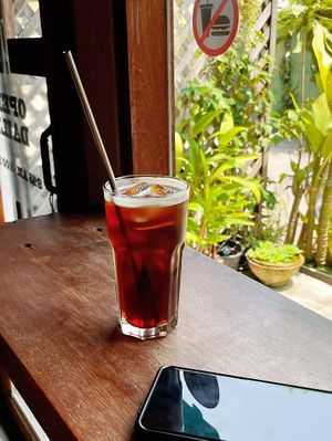 Coffee with metal straw   at Bagel House in Chiang Mai