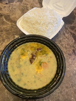 dal and rice. according to the worker this is the only thing without dairy now and none of the naan is vegan either 🫨  at Spice Culture Grocery Store in Winter Garden