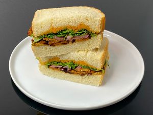 smoky vegan sandwich (cut in half + plated at home) at Distant Worlds Coffeehouse in Seattle