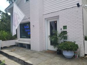 Bodega exterior, love the neon sign! at Baba in Kerhonkson