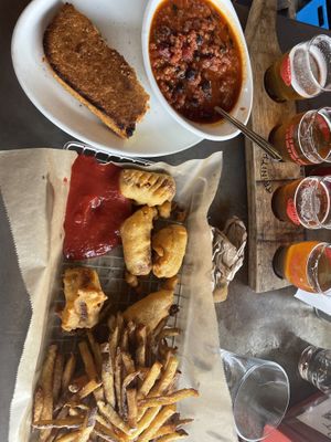 Vegan chili and vegan corn dogs! Awesome atmosphere, cool drinks/beer flights and the patio is dog friendly! Plenty of vegan options I could hardly decide. Will definitely be back  at Trinity Brewing Company in Colorado Springs
