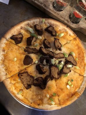 Vegan Buffalo Pizza- just cheeze pizza and the seitan sausage was dry and should have been added after cooking the pizza.  at Trinity Brewing Company in Colorado Springs