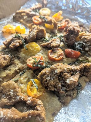 TLC (tastes like chicken) pizza 🍕 at TLC Vegan Kitchen in Richardson