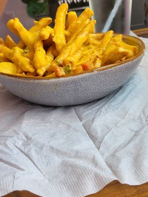 Cheese fries (believe the menu item was loaded fries but we asked for cheese only)  at TLC Vegan Kitchen in Richardson