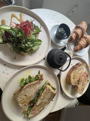 Two croissants, One Rainbow Sourdough, Two cheese toasties  at Greenfinch in Berlin