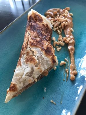 My favourite entree: peanut rotti roll. Best peanut sauce I have ever had in my life. Still thinking about it   at Veggo Sizzle in Five Dock