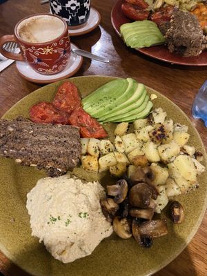 Vegan breakfast with hummus instead of beans.   at Jack's Café in Cusco