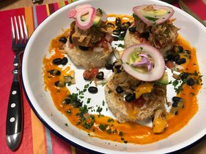 Maniokküchlein mit Jackfruit, Bohnen, Avocsdo unf Sauce at Soul Food by Aris in Zurich