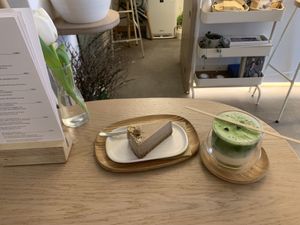 Cashew and Caramel Cake with Matcha Latte  at 4minutes Cafe in Budapest