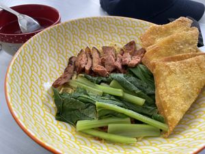 Marinated vegan pork with Chinese kale, 99 baht  at Kaek Kao Kua in Bangkok