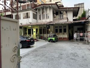 Go to the left side by the stairs at Kaek Kao Kua in Bangkok