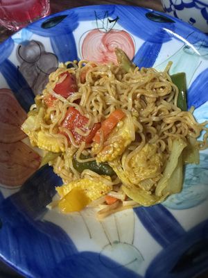 Some of their dinner which they shared in trade to HappyCow stickers   at Kaek Kao Kua in Bangkok