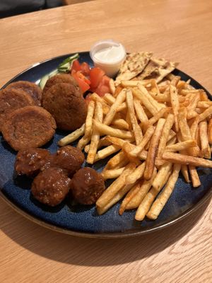 Revitho meal with vegan keftedakia me saltsa side  at Eat Greek in Worcester