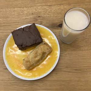 A pastry “sin carne”,a cake with a bocadillo centre topped with chocolate and a rice based drink   at The Vegan Bakery (formerly Panadería Rocks) in Bogota