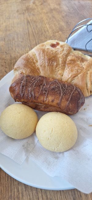 Pan de bono, churro, croissant de bocadillo y queso at The Vegan Bakery (formerly Panadería Rocks) in Bogota