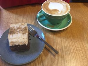 Vegan carrot cake and oat cappuccino  at Goodies Berlin - Warschauer in Berlin