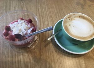 Overnight oats and large cappuccino  at Goodies Berlin - Warschauer in Berlin
